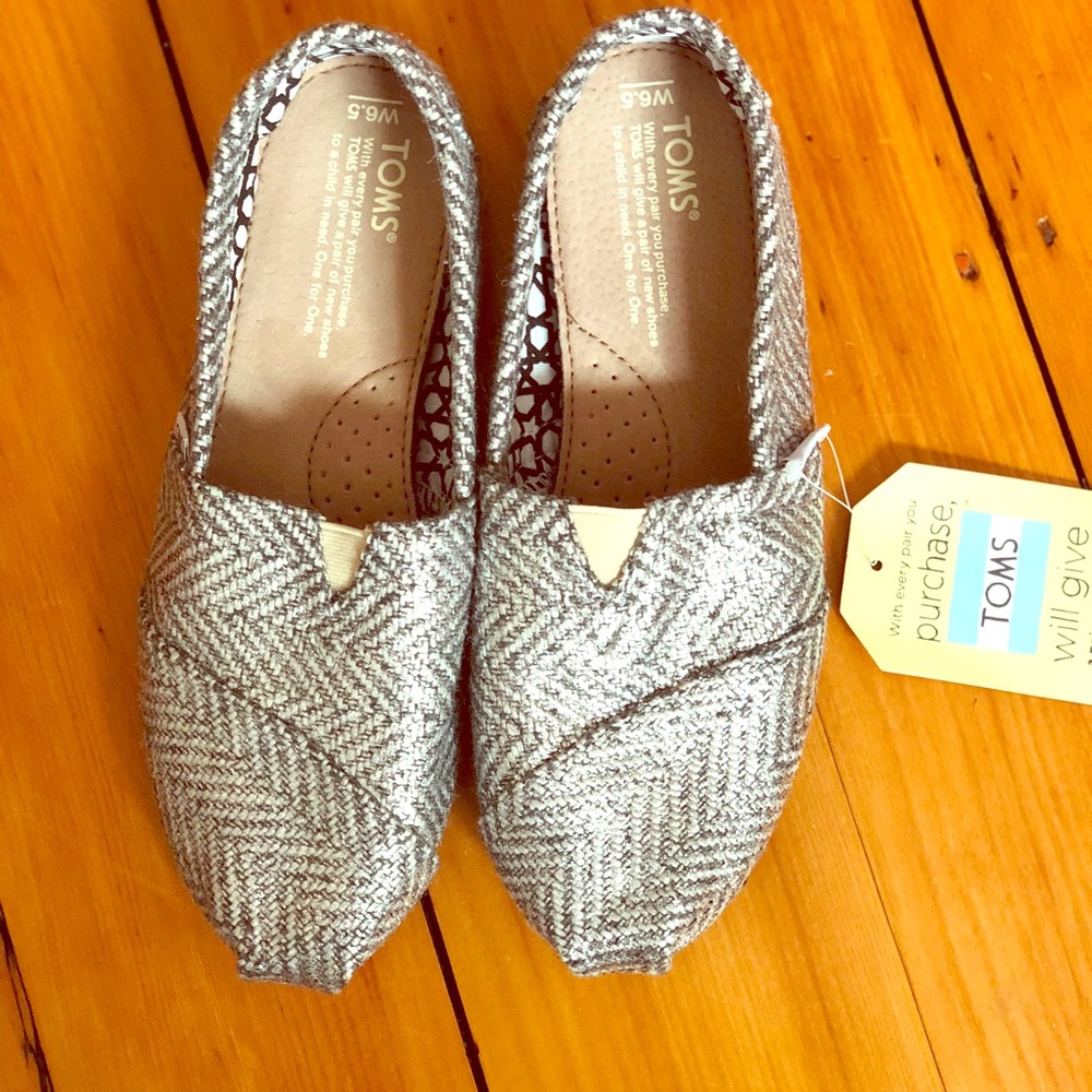 Brand new silver Toms!